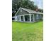 Gray house exterior with white trim, covered porch, and manicured lawn at 1010 Dodd St, Shelby, NC 28152