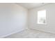 Spacious bedroom with large window and neutral walls at 113 Ryan Ln, Mooresville, NC 28115