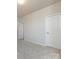 Simple bedroom with carpeted floor and neutral walls at 113 Ryan Ln, Mooresville, NC 28115