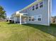 Two-story house with gray siding and a backyard patio at 113 Ryan Ln, Mooresville, NC 28115