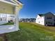 Backyard view of two story house with gray siding at 113 Ryan Ln, Mooresville, NC 28115