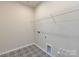 Laundry room with tile floor and wire shelving at 113 Ryan Ln, Mooresville, NC 28115
