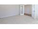 Carpeted office or spare bedroom with French doors at 113 Ryan Ln, Mooresville, NC 28115
