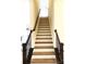 Elegant staircase with dark wood and metal railings at 139 Dabbling Duck Cir, Mooresville, NC 28117