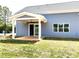 House exterior with covered patio, blue siding and white trim at 139 Dabbling Duck Cir, Mooresville, NC 28117