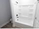 Bathroom with bathtub, shower, and wood-look flooring at 9605 Hwy 52 N None # 4, Wadesboro, NC 28170
