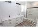 Modern bathroom with double vanity, a large shower, and wood-look flooring at 9605 Hwy 52 N None # 4, Wadesboro, NC 28170