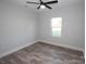 Bright bedroom with ceiling fan and wood-look flooring at 9605 Hwy 52 N None # 4, Wadesboro, NC 28170