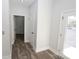 Bright hallway with doors leading to other rooms and exterior access at 9605 Hwy 52 N None # 4, Wadesboro, NC 28170