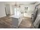 Bright kitchen featuring an island and access to the backyard at 9605 Hwy 52 N None # 4, Wadesboro, NC 28170
