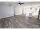 Open living space with wood-look flooring and a ceiling fan at 9605 Hwy 52 N None # 4, Wadesboro, NC 28170