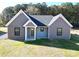 Gray-sided house with a dark gray roof and white columns at 9617 Hwy 52 N None # 3, Wadesboro, NC 28170