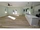 Open living space with light walls and wood-look floors at 9617 Hwy 52 N None # 3, Wadesboro, NC 28170