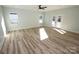 Spacious living area with light walls and vinyl flooring at 9617 Hwy 52 N None # 3, Wadesboro, NC 28170