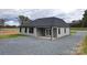 Gray vinyl-sided house with a gray roof and a covered patio at 9617 Hwy 52 N None # 3, Wadesboro, NC 28170