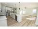 Open concept kitchen with stainless steel appliances and an island at 9617 Hwy 52 N None # 3, Wadesboro, NC 28170