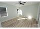 Bright bedroom with ceiling fan and hardwood floors at 9617 Hwy 52 N None # 3, Wadesboro, NC 28170