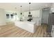Open concept kitchen with white cabinets and quartz countertop at 9617 Hwy 52 N None # 3, Wadesboro, NC 28170