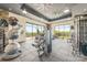 State-of-the-art fitness center with various equipment and large windows at 130 Cherokee Rd # 102, Charlotte, NC 28207