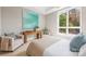 Spacious bedroom with large window and seating area at 130 Cherokee Rd # 102, Charlotte, NC 28207