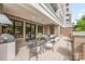 Relaxing outdoor patio with seating area and grill, ideal for entertaining at 130 Cherokee Rd # 102, Charlotte, NC 28207