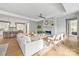 Bright living room with an open floor plan and fireplace at 130 Cherokee Rd # 102, Charlotte, NC 28207