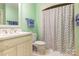 Clean bathroom with double vanity and shower/tub combo at 205 Vauxhall Dr, Shelby, NC 28150
