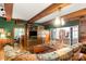 Spacious living room with exposed beams and comfortable seating at 205 Vauxhall Dr, Shelby, NC 28150