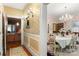 Elegant dining room with floral wallpaper and a charming table setting at 205 Vauxhall Dr, Shelby, NC 28150