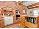 Kitchen with exposed brick, double oven, and island at 205 Vauxhall Dr, Shelby, NC 28150