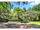 House exterior showcasing a large front porch and mature landscaping at 205 Vauxhall Dr, Shelby, NC 28150
