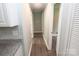 Hallway with light gray walls and wood-look floors at 412 Lakeview Dr, Wadesboro, NC 28170