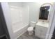 Clean bathroom with a bathtub, shower, and updated vanity at 412 Lakeview Dr, Wadesboro, NC 28170