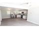 Modern kitchen with white cabinets and stainless steel appliances at 412 Lakeview Dr, Wadesboro, NC 28170