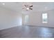 Bright bedroom with ceiling fan and vinyl plank flooring at 108 Megby Trl, Statesville, NC 28677
