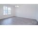 Bright dining room with hardwood floors and large window at 108 Megby Trl, Statesville, NC 28677