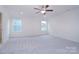 Bedroom with ceiling fan and carpet at 108 Megby Trl, Statesville, NC 28677