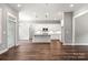 Modern kitchen with white cabinets, granite counters, and island at 121 Arboretum Way, Shelby, NC 28152