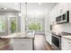 Spacious kitchen with island, stainless steel appliances, and hardwood floors at 121 Arboretum Way, Shelby, NC 28152