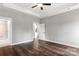 Spacious bedroom with hardwood floors and access to bathroom at 121 Arboretum Way, Shelby, NC 28152