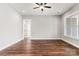 Light-filled bedroom with hardwood floors and ceiling fan at 121 Arboretum Way, Shelby, NC 28152