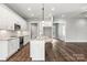 Modern kitchen with white cabinets and granite countertops at 121 Arboretum Way, Shelby, NC 28152