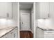 Modern kitchen features granite countertops and white cabinetry at 121 Arboretum Way, Shelby, NC 28152