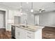 Modern kitchen with stainless steel appliances and granite countertops at 121 Arboretum Way, Shelby, NC 28152