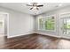 Spacious living room with dark hardwood floors and large windows at 121 Arboretum Way, Shelby, NC 28152