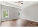 Bright bedroom with hardwood floors and ceiling fan at 121 Arboretum Way, Shelby, NC 28152