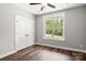 Charming bedroom with hardwood floors and ceiling fan at 121 Arboretum Way, Shelby, NC 28152