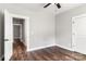 Spacious bedroom with hardwood floors and access to hallway at 121 Arboretum Way, Shelby, NC 28152