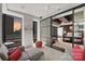 Private balcony with seating and stunning city views at sunset at 139 S Tryon St # 6, Charlotte, NC 28202