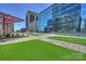 Modern rooftop deck with city views and seating area at 139 S Tryon St # 6, Charlotte, NC 28202